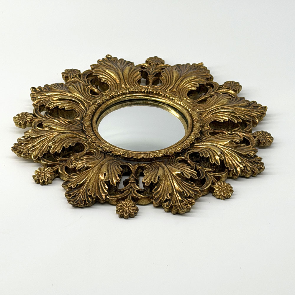 Antiqued ornate gold mirror